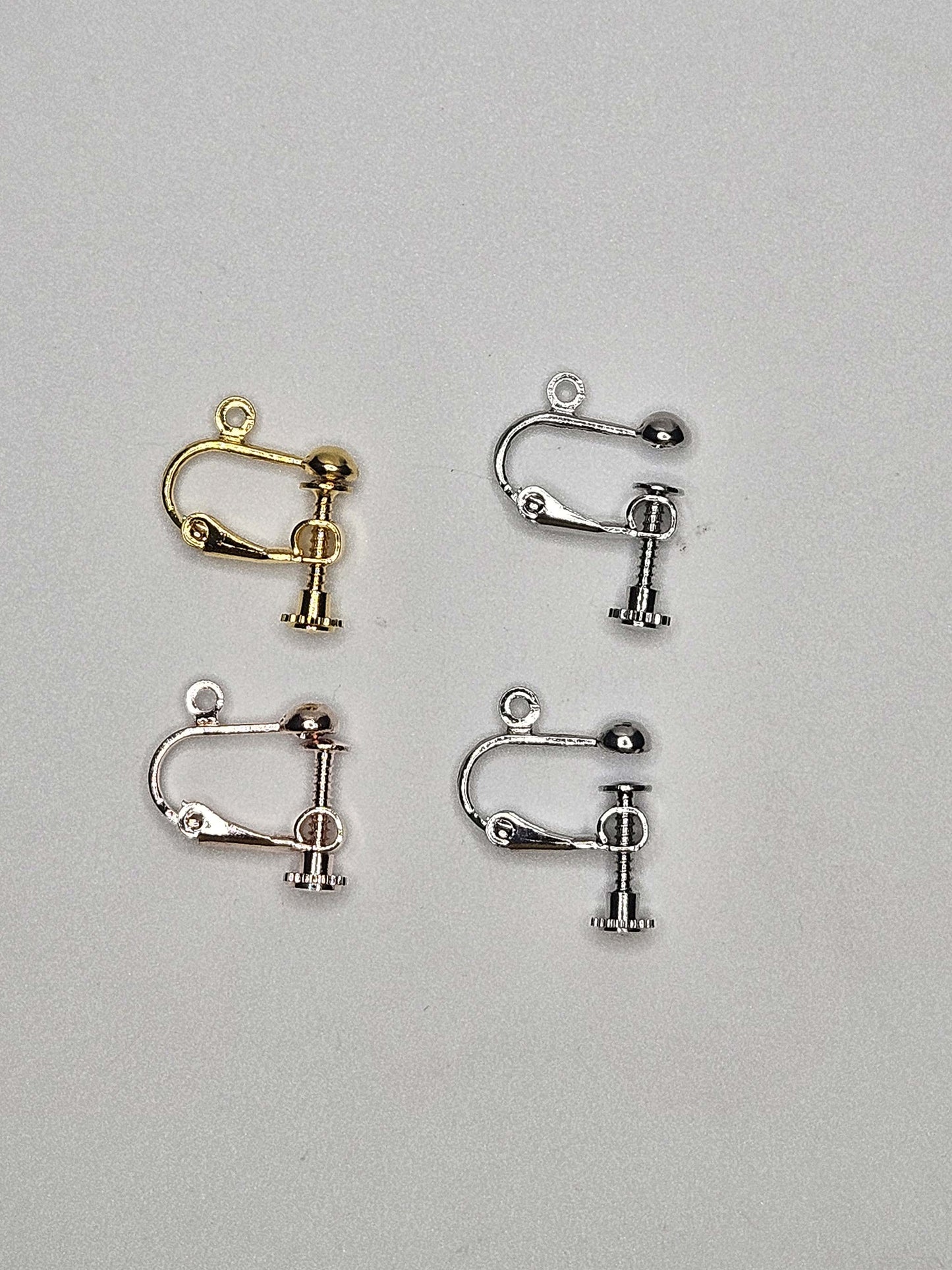 Four metal screw-on clip on findings