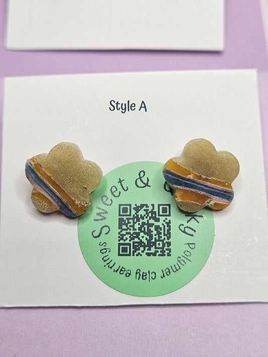 Pair of flower-shaped earrings on a card with 'Sweet & Style A' text and a QR code.