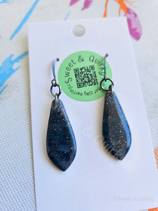 Teardrop-shaped earrings on a Sweet & Quirky branded card with a QR code.