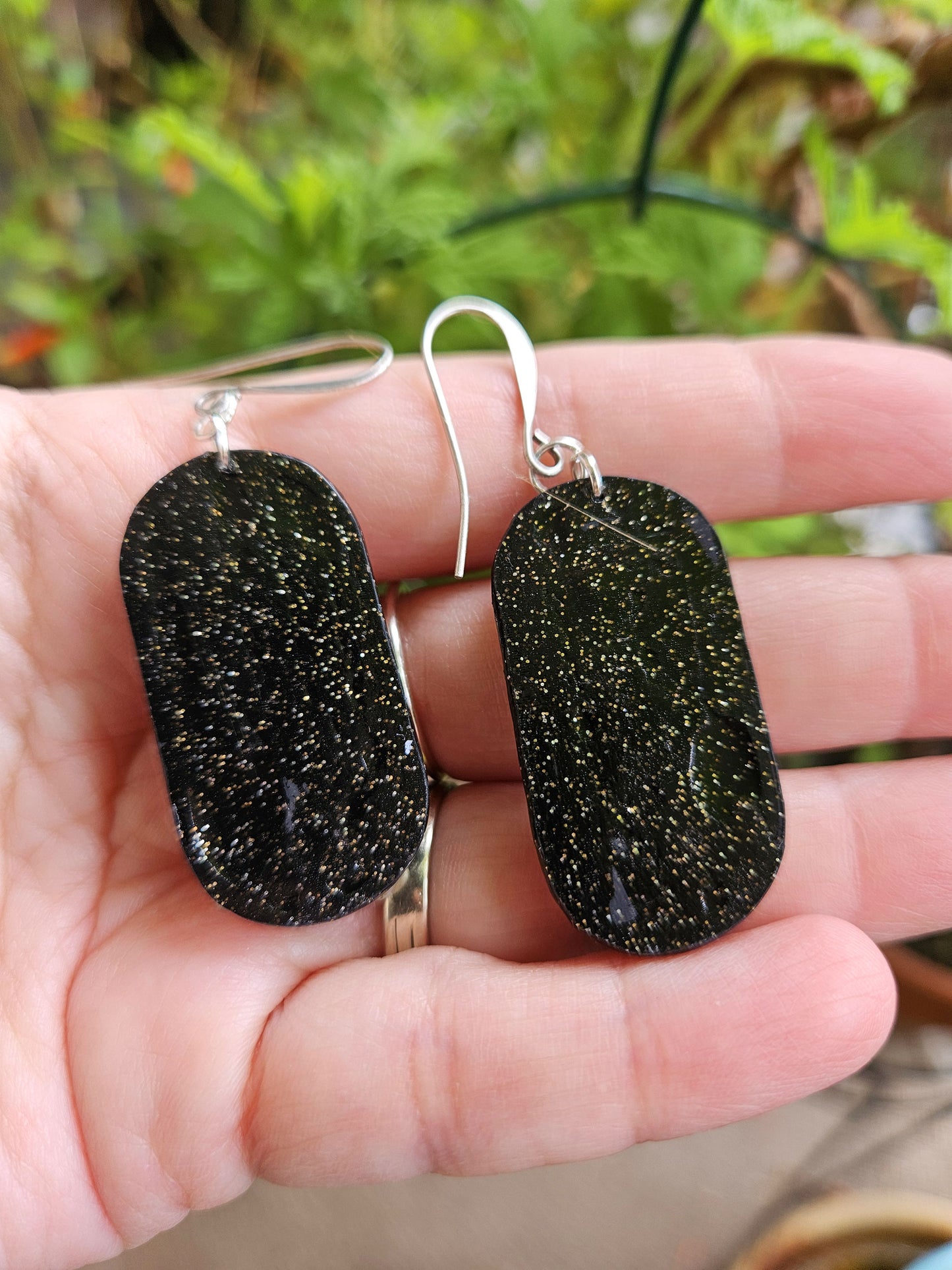 Back of the earrings - all black with sparkle glitter.