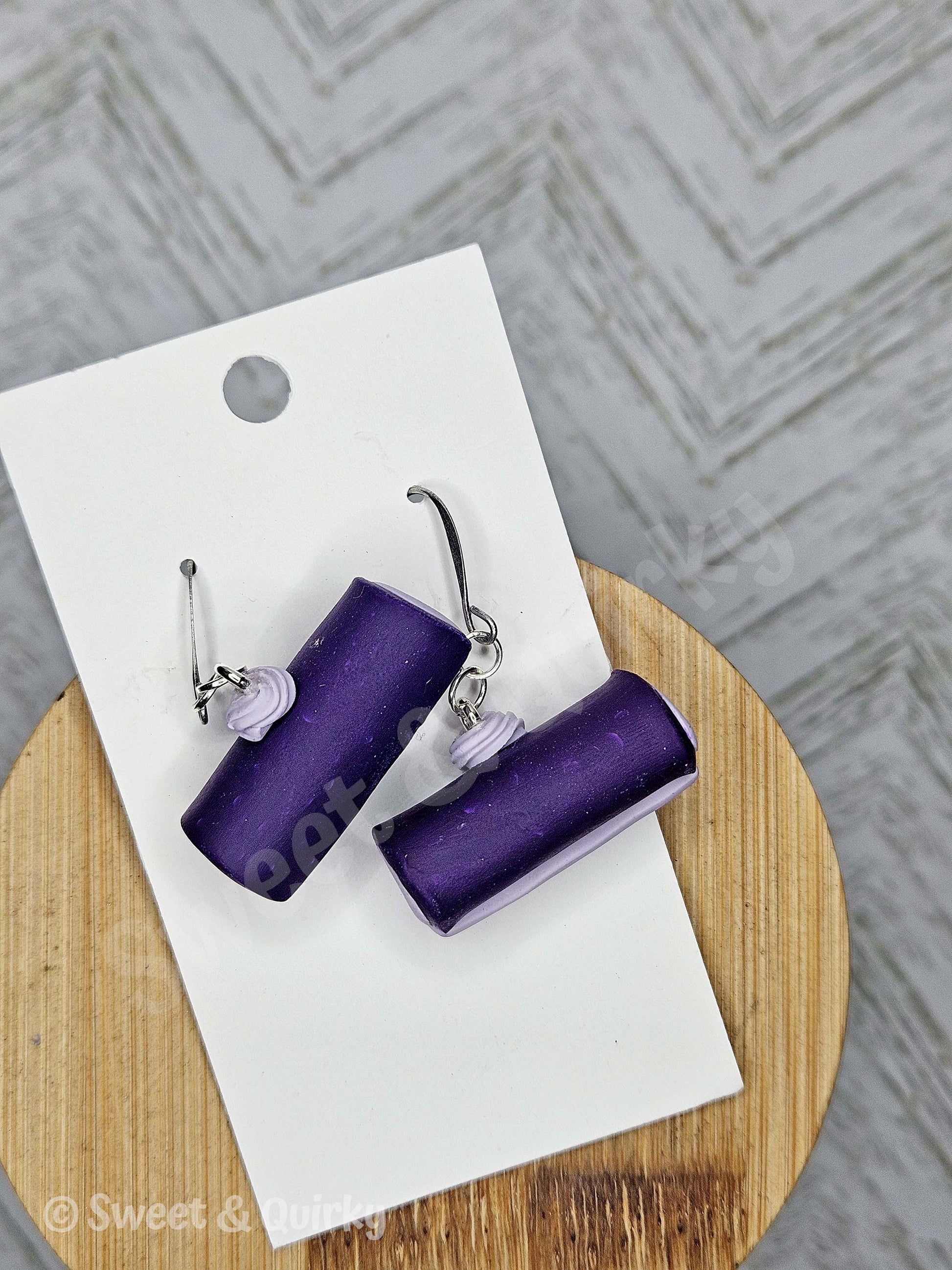 Purple and lavender swirled ube inspired food earrings.