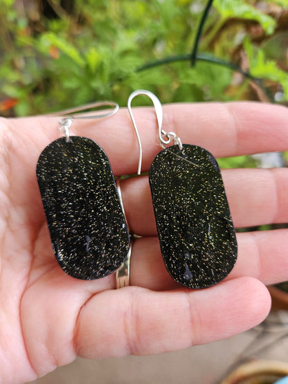 Back of the earrings - all black with sparkle glitter.